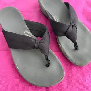 Clark’s grey flip flops.Size 9.